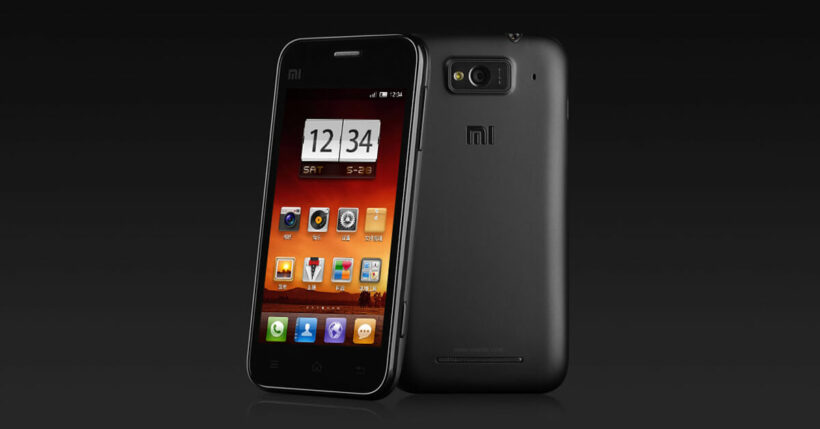Xiaomi Mi 1 smartphone shown from front and back, displaying MIUI running on Android with app icons and a clock widget