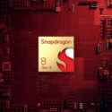 Snapdragon 8 Gen 3 chip on a red circuit board background