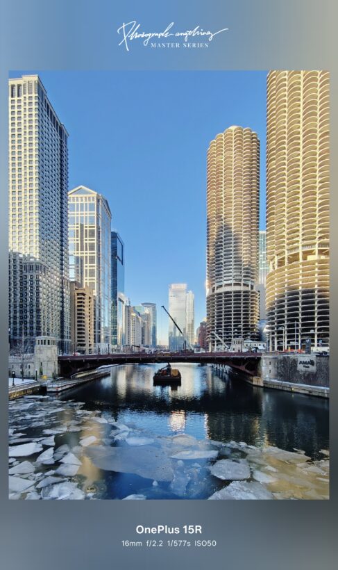 OnePlus 15R ultrawide camera sample: icy Chicago River with Marina City towers, shot at 16mm f/2.2 1/577s ISO50